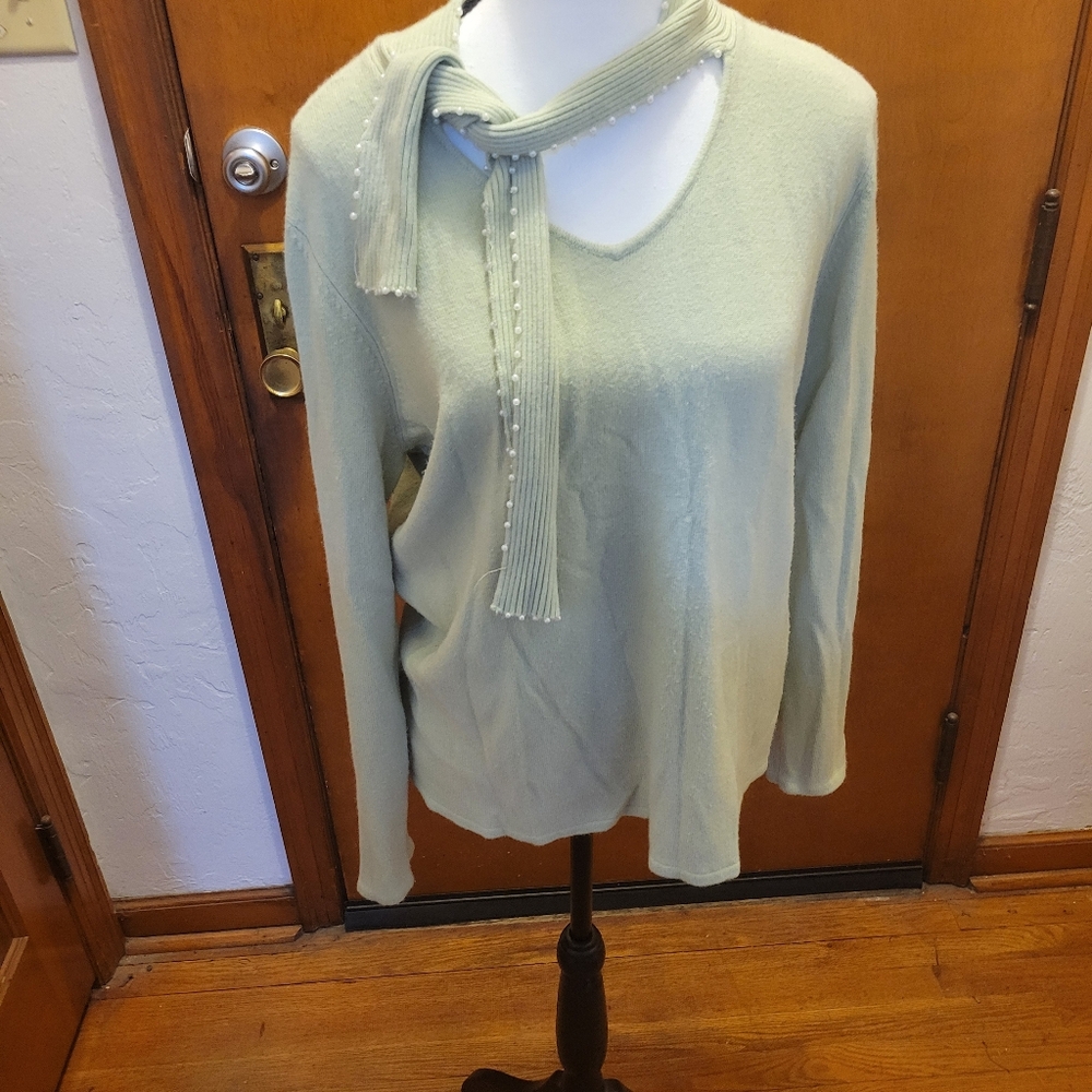Green sweater with beaded scarf attached